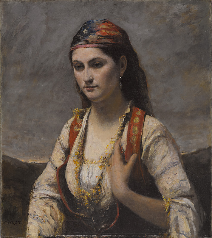 a young woman shown in muted, melancholy colors with her eyes cast slightly downward and her left hand raised to her heart