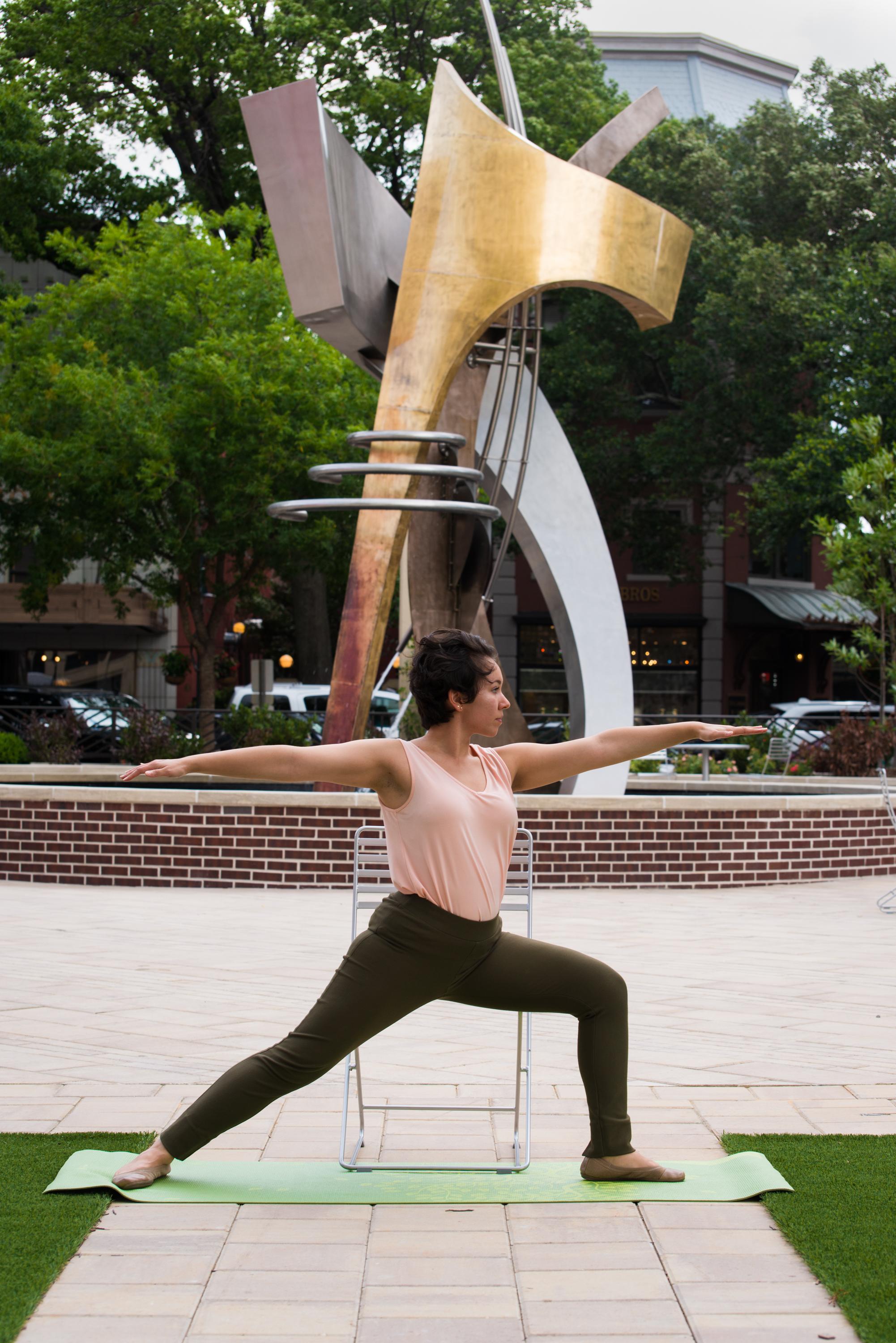 Elizabeth Houck-Zozaya doing Yoga on boyd plaza