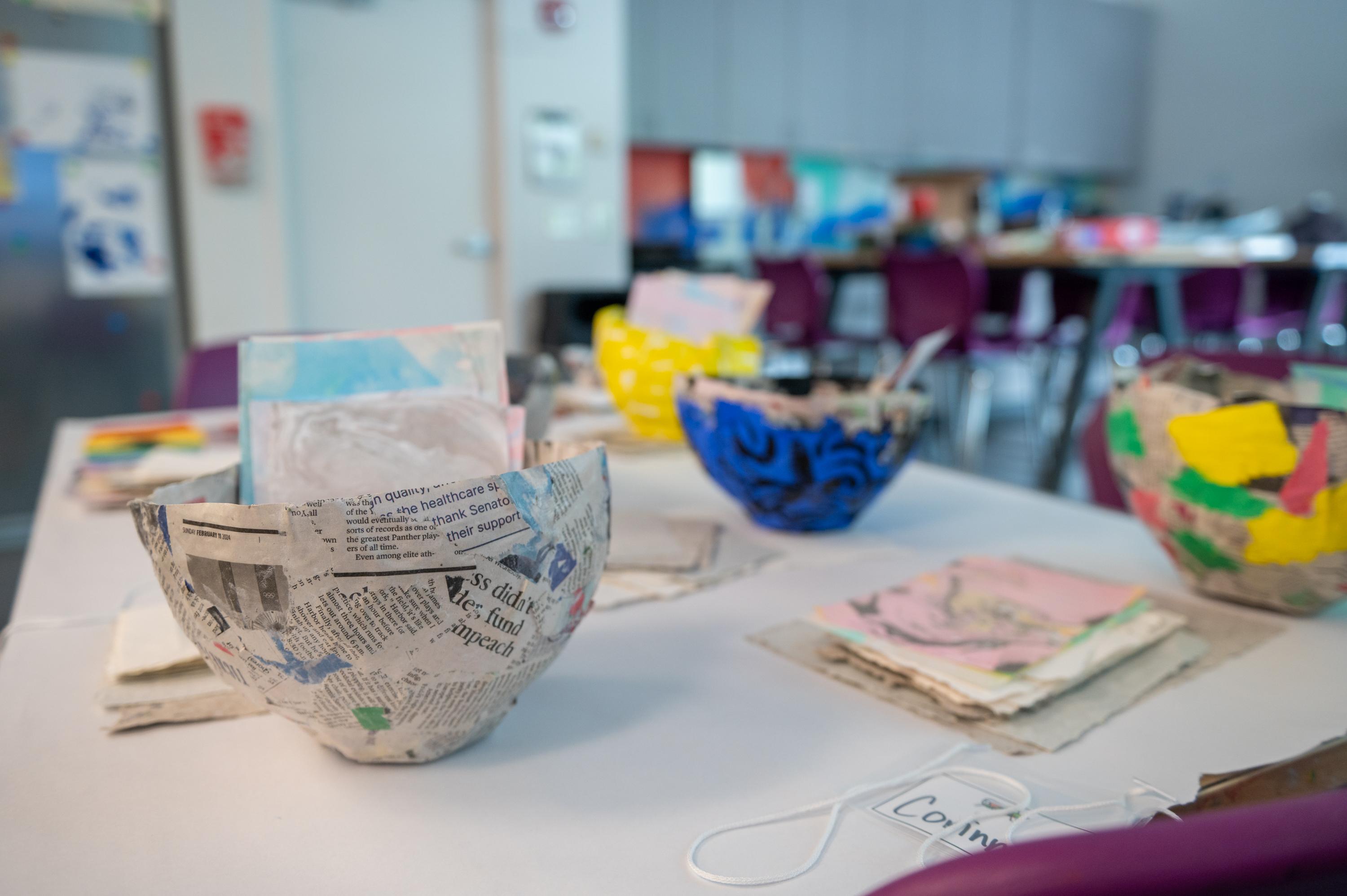 bowls made out of paper on a table